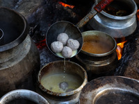 Traditional Kashmiri chefs cut lamb meat to prepare wazwan dishes in Sopore, Jammu and Kashmir, India, on September 14, 2024. Wazwan is a tr...