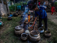 Traditional Kashmiri chefs cut lamb meat to prepare wazwan dishes in Sopore, Jammu and Kashmir, India, on September 14, 2024. Wazwan is a tr...