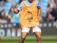 Rico Lewis #82 of Manchester City F.C. during the Premier League match between Manchester City and Brentford at the Etihad Stadium in Manche...