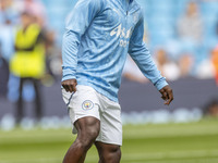 Jeremy Doku #11 of Manchester City F.C. during the Premier League match between Manchester City and Brentford at the Etihad Stadium in Manch...