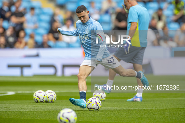 Phil Foden #47 of Manchester City F.C. during the Premier League match between Manchester City and Brentford at the Etihad Stadium in Manche...