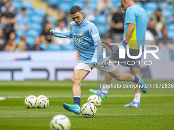 Phil Foden #47 of Manchester City F.C. during the Premier League match between Manchester City and Brentford at the Etihad Stadium in Manche...