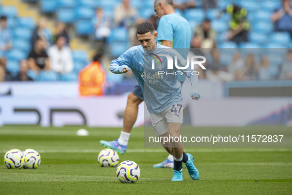 Phil Foden #47 of Manchester City F.C. during the Premier League match between Manchester City and Brentford at the Etihad Stadium in Manche...