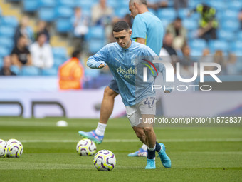 Phil Foden #47 of Manchester City F.C. during the Premier League match between Manchester City and Brentford at the Etihad Stadium in Manche...