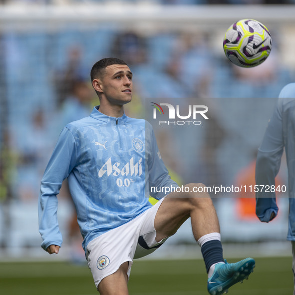 Phil Foden #47 of Manchester City F.C. during the Premier League match between Manchester City and Brentford at the Etihad Stadium in Manche...