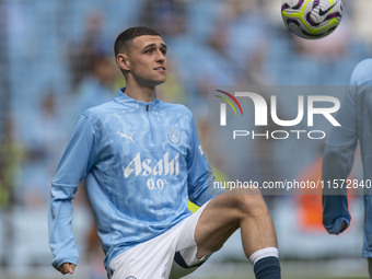 Phil Foden #47 of Manchester City F.C. during the Premier League match between Manchester City and Brentford at the Etihad Stadium in Manche...