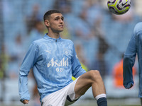 Phil Foden #47 of Manchester City F.C. during the Premier League match between Manchester City and Brentford at the Etihad Stadium in Manche...