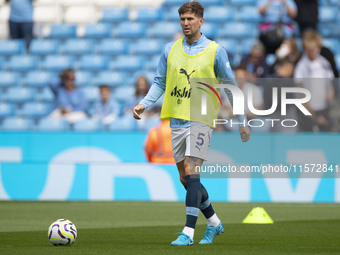 John Stones #5 of Manchester City F.C. during the Premier League match between Manchester City and Brentford at the Etihad Stadium in Manche...