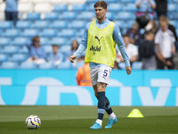 John Stones #5 of Manchester City F.C. during the Premier League match between Manchester City and Brentford at the Etihad Stadium in Manche...