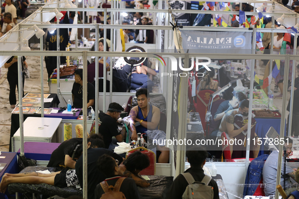 General view of the stalls at the Himalayan Tattoo Convention in Lalitpur, Nepal, on August 14, 2024. The tattoo summit, supported by the Na...