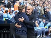 Manchester City F.C. manager Pep Guardiola and Brentford manager shake hands during the Premier League match between Manchester City and Bre...