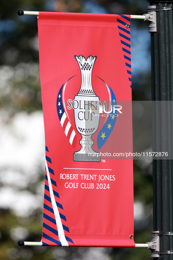 GAINESVILLE, VIRGINIA - SEPTEMBER 14: A banner is displayed on a lightpost with the Solheim Cup logo during Day Two of the Solheim Cup at Ro...