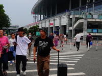 A large number of passengers prepare to travel at Yichang East Railway Station during the Mid-Autumn Festival holiday in Yichang, China, on...