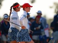 GAINESVILLE, VIRGINIA - SEPTEMBER 14: Sarah Schmelzel of the United States (R, foreground) and Lilia Vu of of Team USA (L, background) wait...