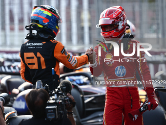 Oscar Piastri of McLaren and Charles Leclerc of Ferrari after qualifying ahead of the Formula 1 Grand Prix of Azerbaijan at Baku City Circui...