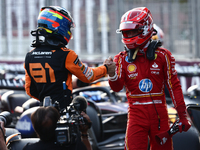 Oscar Piastri of McLaren and Charles Leclerc of Ferrari after qualifying ahead of the Formula 1 Grand Prix of Azerbaijan at Baku City Circui...