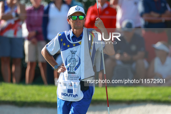 GAINESVILLE, VIRGINIA - SEPTEMBER 14: The caddie for Celine Boutier of Team Europe waits on the 7th green during Day Two of the Solheim Cup...