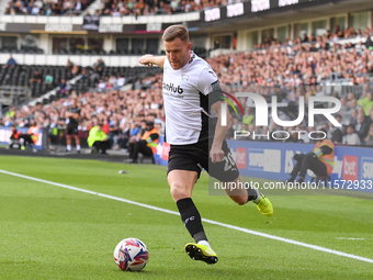 Callum Elder of Derby County lines up a cross during the Sky Bet Championship match between Derby County and Cardiff City at Pride Park in D...