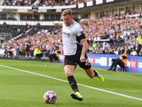 Callum Elder of Derby County lines up a cross during the Sky Bet Championship match between Derby County and Cardiff City at Pride Park in D...