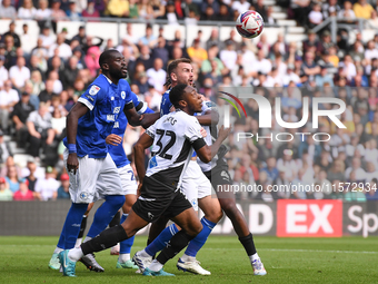 Ebou Adams of Derby County battles for the ball during the Sky Bet Championship match between Derby County and Cardiff City at Pride Park in...