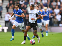 Nathaniel Mendez-Laing of Derby County is under pressure from Perry Ng of Cardiff City during the Sky Bet Championship match between Derby C...