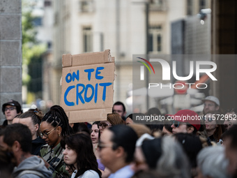 A protestor holds a placard reading ''we believe you'' during a demonstration in support of Gisele Pelicot in Rennes, France, on September 1...