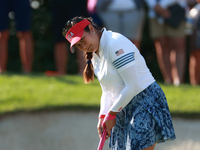 GAINESVILLE, VIRGINIA - SEPTEMBER 14: Lilia Vu of of Team USA prepares to putt on the 7th green during Day Two of the Solheim Cup at Robert...