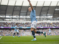 Erling Haaland #9 of Manchester City F.C. celebrates his goal during the Premier League match between Manchester City and Brentford at the E...