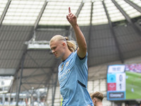 Erling Haaland #9 of Manchester City F.C. celebrates his goal during the Premier League match between Manchester City and Brentford at the E...