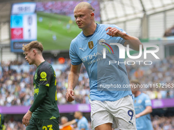 Erling Haaland #9 of Manchester City F.C. celebrates his goal during the Premier League match between Manchester City and Brentford at the E...