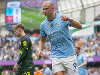 Erling Haaland #9 of Manchester City F.C. celebrates his goal during the Premier League match between Manchester City and Brentford at the E...