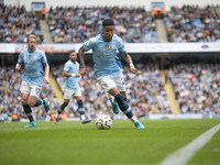 Savinho #26 of Manchester City F.C. during the Premier League match between Manchester City and Brentford at the Etihad Stadium in Mancheste...