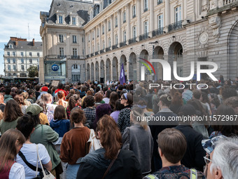 People gather during a demonstration in support of Gisele Pelicot in Rennes, France, on September 14, 2024. Gisele Pelicot becomes the embod...