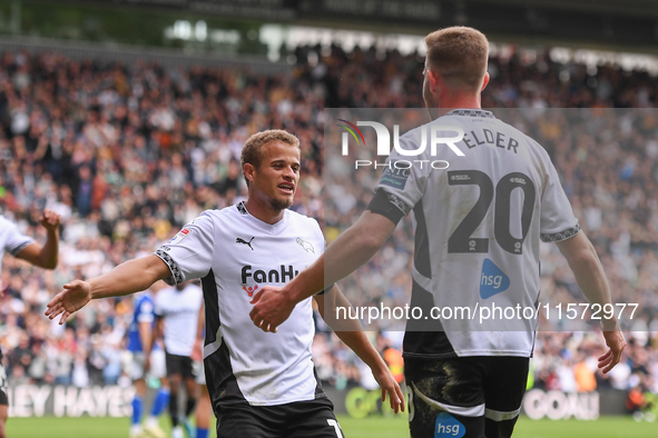 Kenzo Goudmijn of Derby County celebrates with Callum Elder of Derby County after scoring a goal to make it 1-0 during the Sky Bet Champions...