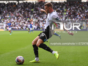 Callum Elder of Derby County crosses the ball, leading to his side's first goal during the Sky Bet Championship match between Derby County a...