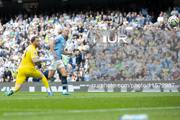 Erling Haaland #9 of Manchester City F.C. scores a goal during the Premier League match between Manchester City and Brentford at the Etihad...