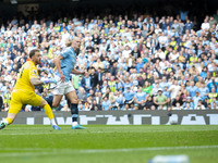 Erling Haaland #9 of Manchester City F.C. scores a goal during the Premier League match between Manchester City and Brentford at the Etihad...