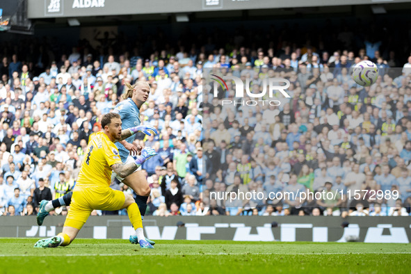 Erling Haaland #9 of Manchester City F.C. scores a goal during the Premier League match between Manchester City and Brentford at the Etihad...