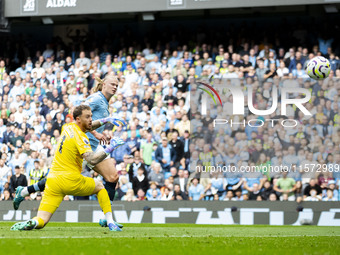 Erling Haaland #9 of Manchester City F.C. scores a goal during the Premier League match between Manchester City and Brentford at the Etihad...