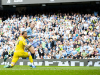 Erling Haaland #9 of Manchester City F.C. scores a goal during the Premier League match between Manchester City and Brentford at the Etihad...