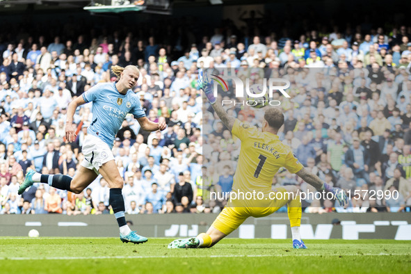 Erling Haaland #9 of Manchester City F.C. scores a goal during the Premier League match between Manchester City and Brentford at the Etihad...