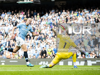 Erling Haaland #9 of Manchester City F.C. scores a goal during the Premier League match between Manchester City and Brentford at the Etihad...