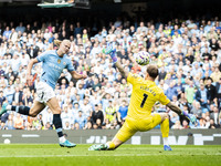 Erling Haaland #9 of Manchester City F.C. scores a goal during the Premier League match between Manchester City and Brentford at the Etihad...