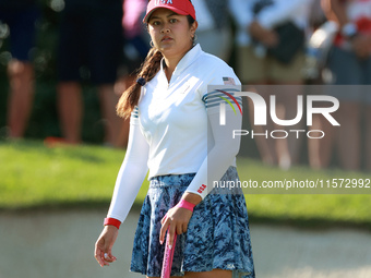 GAINESVILLE, VIRGINIA - SEPTEMBER 14: Lilia Vu of Team USA follows her putt on the 7th green during Day Two of the Solheim Cup at Robert Tre...