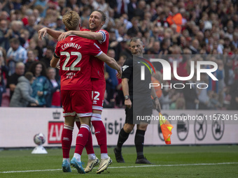 Luke Ayling of Middlesbrough celebrates with goalscorer Tommy Conway of Middlesbrough during the Sky Bet Championship match between Middlesb...