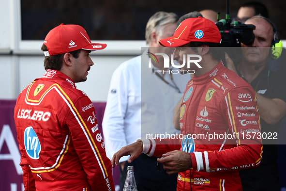 Charles Leclerc and Carlos Sainz of Ferrari after qualifying ahead of the Formula 1 Grand Prix of Azerbaijan at Baku City Circuit in Baku, A...