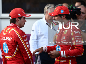 Charles Leclerc and Carlos Sainz of Ferrari after qualifying ahead of the Formula 1 Grand Prix of Azerbaijan at Baku City Circuit in Baku, A...