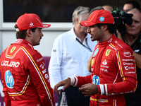 Charles Leclerc and Carlos Sainz of Ferrari after qualifying ahead of the Formula 1 Grand Prix of Azerbaijan at Baku City Circuit in Baku, A...