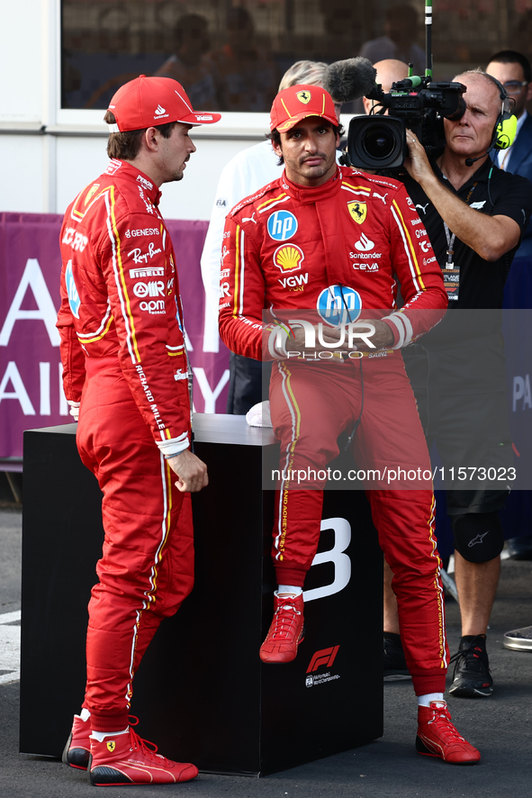 Charles Leclerc and Carlos Sainz of Ferrari after qualifying ahead of the Formula 1 Grand Prix of Azerbaijan at Baku City Circuit in Baku, A...