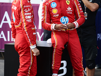 Charles Leclerc and Carlos Sainz of Ferrari after qualifying ahead of the Formula 1 Grand Prix of Azerbaijan at Baku City Circuit in Baku, A...